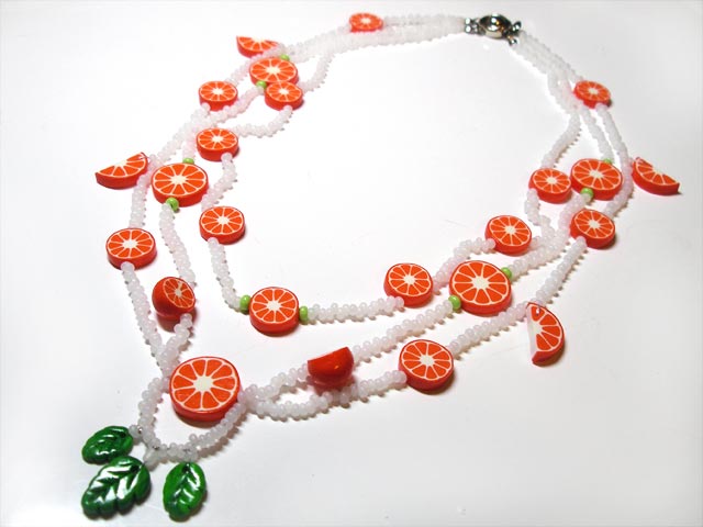 oranges-beads-white.jpg