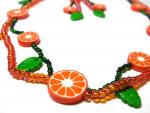 oranges-beads-orange-green-fragment.jpg